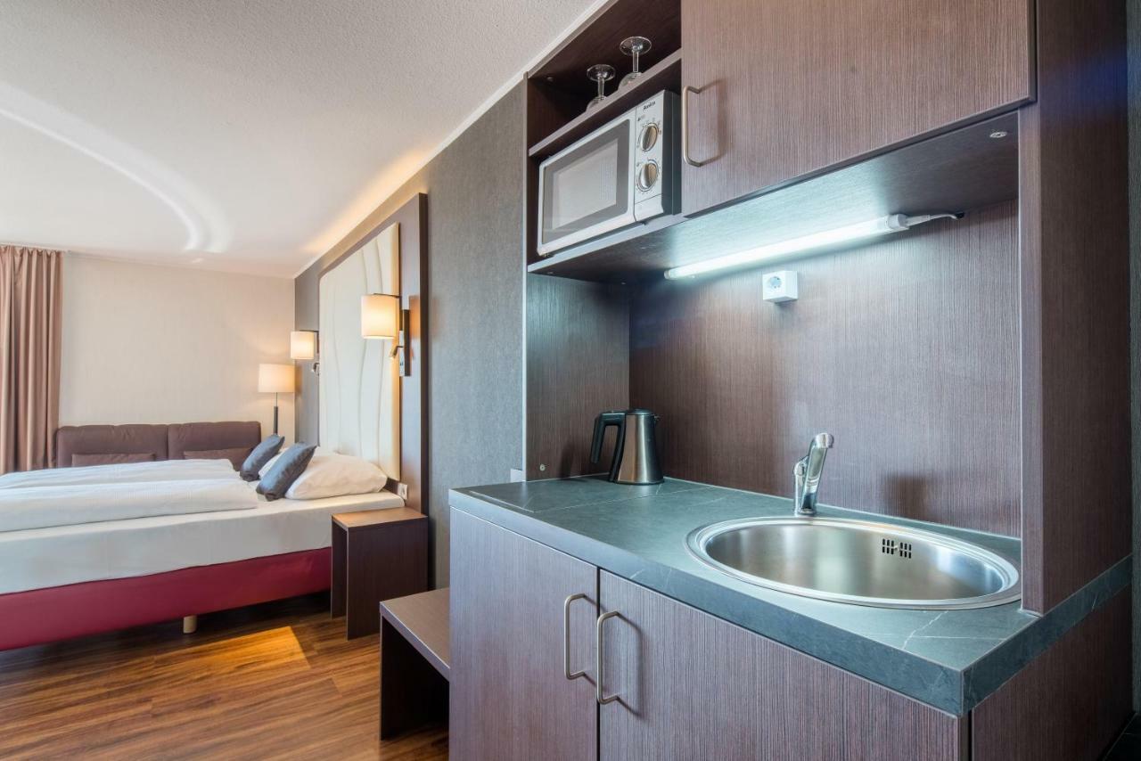 Hotel Amedia Boardinghouse Frankfurt Airport à Raunheim Extérieur photo