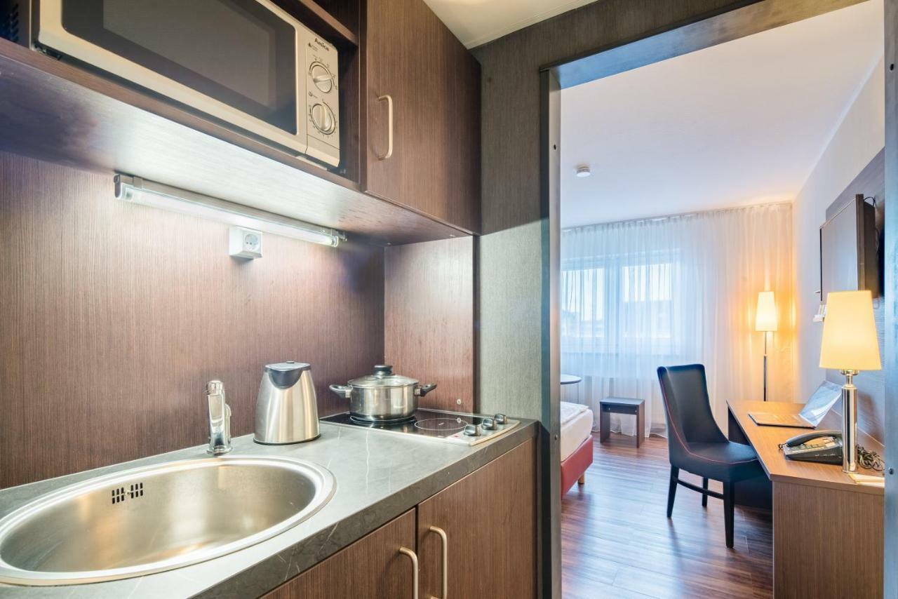 Hotel Amedia Boardinghouse Frankfurt Airport à Raunheim Extérieur photo
